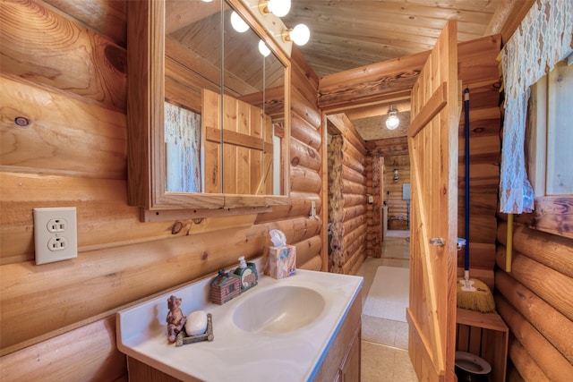 425 S O St, Sula, MT 59871 - bathroom with rustic walls and vanity