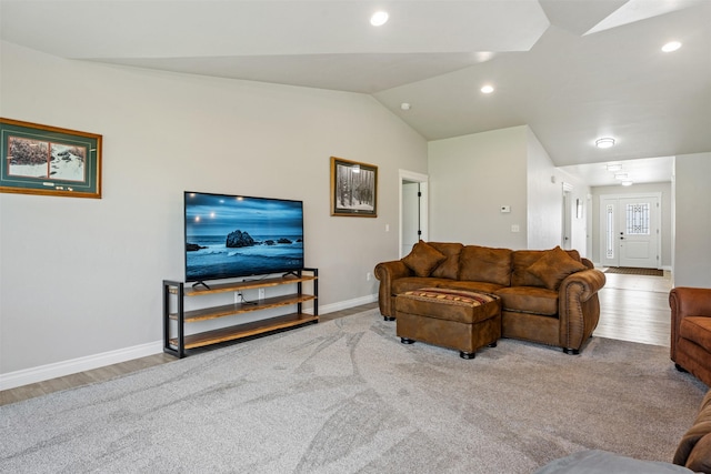 15276 Tyson Way, Frenchtown, MT 59834 - living area with lofted ceiling, baseboards, wood finished floors, and recessed lighting