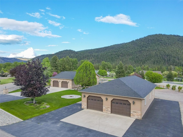 700 Airfield Rd, Libby, MT 59923 - view of mountain backdrop with a heavily wooded area