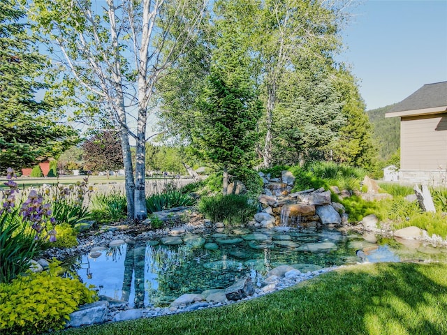 700 Airfield Rd, Libby, MT 59923 - view of yard with a small pond