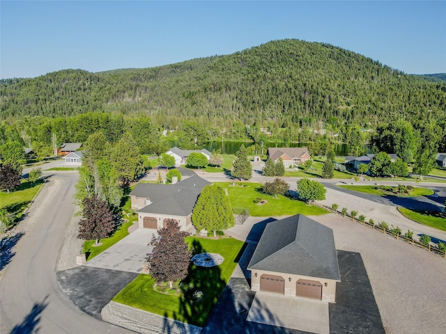 700 Airfield Rd, Libby, MT 59923 - drone / aerial view of a forest and a mountain backdrop