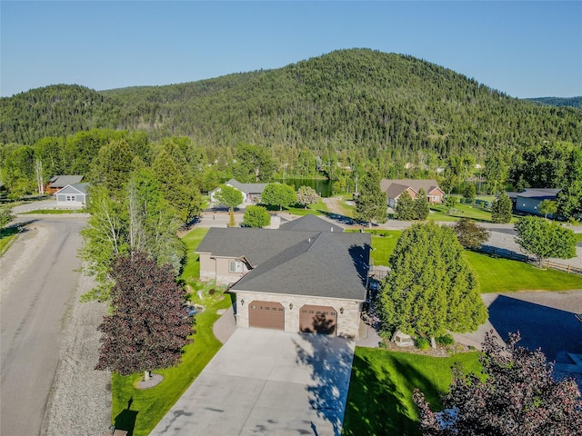 700 Airfield Rd, Libby, MT 59923 - bird's eye view of a heavily wooded area and mountains
