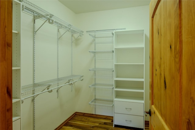 700 Airfield Rd, Libby, MT 59923 - walk in closet featuring dark wood-style floors