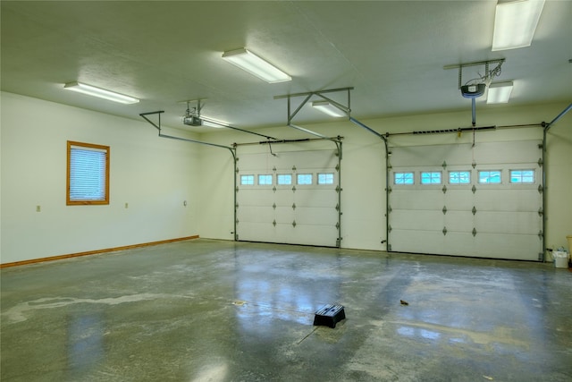 700 Airfield Rd, Libby, MT 59923 - garage featuring a garage door opener