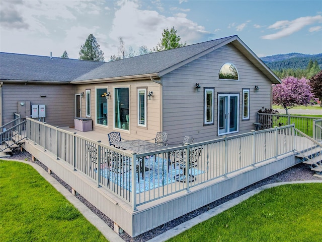 700 Airfield Rd, Libby, MT 59923 - back of property with a deck and a yard
