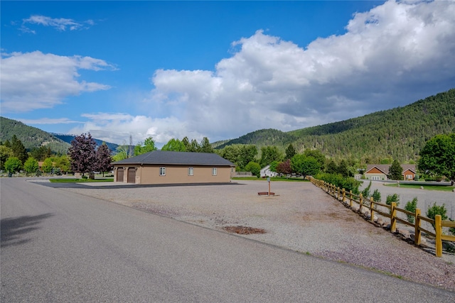 700 Airfield Rd, Libby, MT 59923 - exterior space with a mountain view and a wooded view