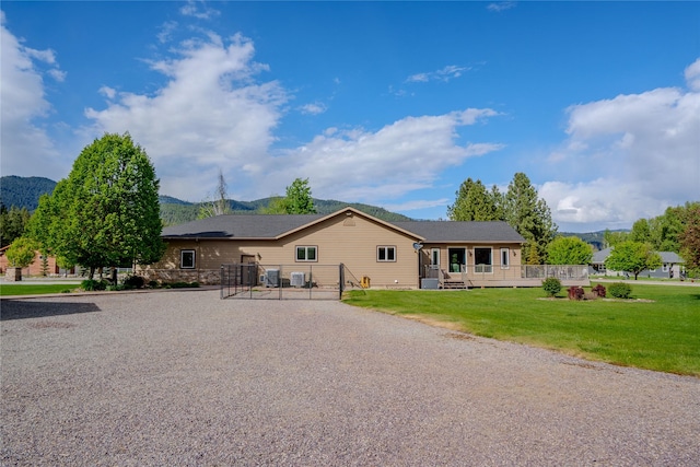 700 Airfield Rd, Libby, MT 59923 - view of front of home featuring a mountain view and a front yard