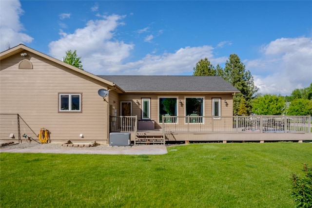 700 Airfield Rd, Libby, MT 59923 - back of house featuring a lawn and a wooden deck