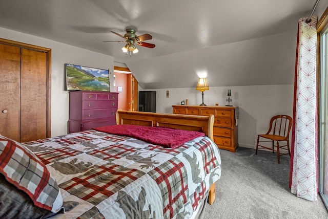 33893 Redgate Dr, Bigfork, MT 59911 - bedroom featuring light carpet, lofted ceiling, a closet, and a ceiling fan