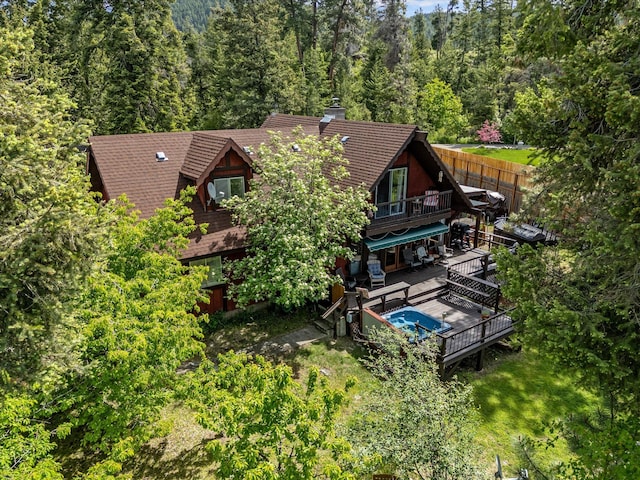 33893 Redgate Dr, Bigfork, MT 59911 - aerial view of property and surrounding area with a forest and a pool