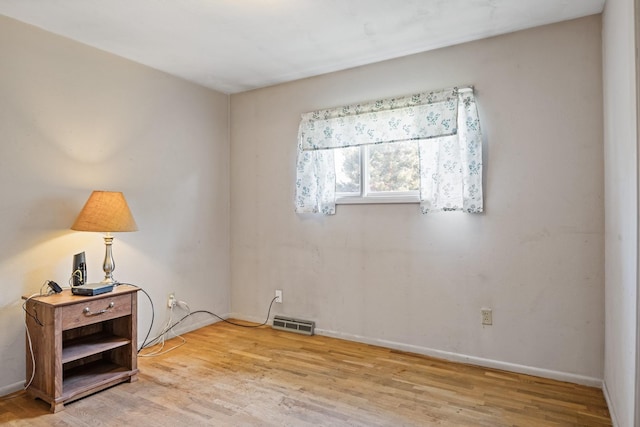2015 Tower St, Missoula, MT 59804 - unfurnished room with wood finished floors and baseboards