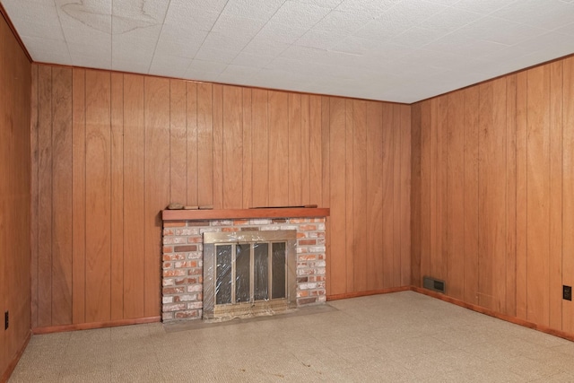 2015 Tower St, Missoula, MT 59804 - unfurnished living room with a fireplace, wooden walls, and baseboards