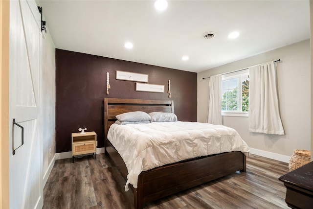 1296 Bighorn Rd, Helena, MT 59602 - bedroom featuring dark wood-style flooring, baseboards, and recessed lighting