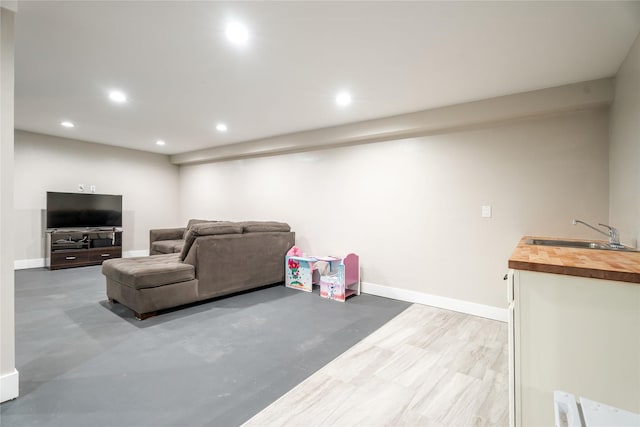 1296 Bighorn Rd, Helena, MT 59602 - living room with recessed lighting, baseboards, and concrete flooring