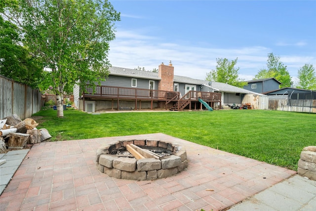 1296 Bighorn Rd, Helena, MT 59602 - view of patio featuring a fire pit, a wooden deck, and stairway