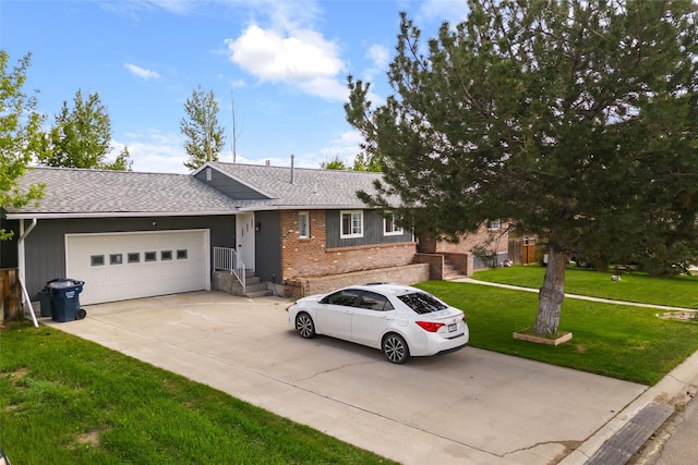 1296 Bighorn Rd, Helena, MT 59602 - ranch-style house featuring concrete driveway, a garage, roof with shingles, a front yard, and brick siding