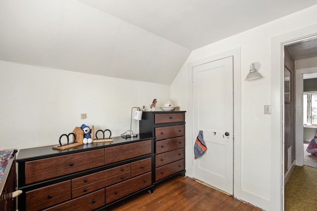 151 6th Ln NE, Fairfield, MT 59436 - bedroom with dark wood-style flooring and vaulted ceiling