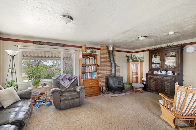 151 6th Ln NE, Fairfield, MT 59436 - living area featuring a wood stove, carpet flooring, and a textured ceiling