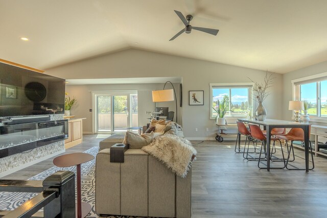 4134 Fox Ridge Dr, Helena, MT 59602 - living area with lofted ceiling, ceiling fan, plenty of natural light, wood finished floors, and recessed lighting