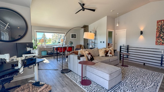 4134 Fox Ridge Dr, Helena, MT 59602 - living area with wood finished floors, vaulted ceiling, and a ceiling fan