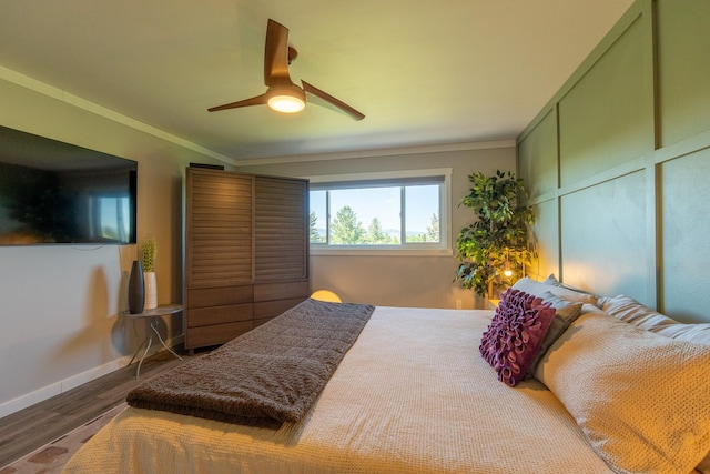 4134 Fox Ridge Dr, Helena, MT 59602 - bedroom with wood finished floors, crown molding, a ceiling fan, and baseboards