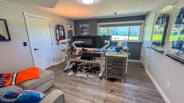 4134 Fox Ridge Dr, Helena, MT 59602 - office featuring baseboards, wood finished floors, and wine cooler