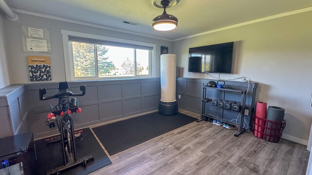4134 Fox Ridge Dr, Helena, MT 59602 - workout room featuring crown molding and wood finished floors