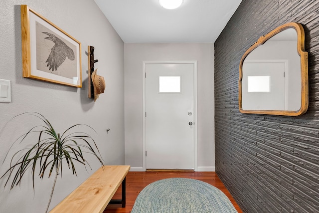 630 Woodworth Ave, Missoula, MT 59801 - entryway featuring wood finished floors and an accent wall