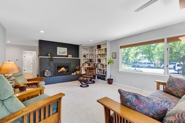 630 Woodworth Ave, Missoula, MT 59801 - living room with carpet floors, a fireplace, and recessed lighting