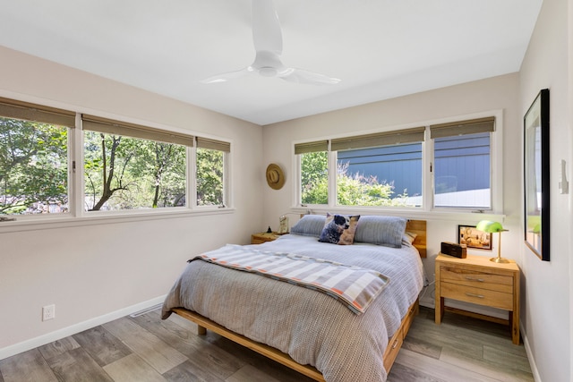 630 Woodworth Ave, Missoula, MT 59801 - bedroom with light wood-type flooring and a ceiling fan