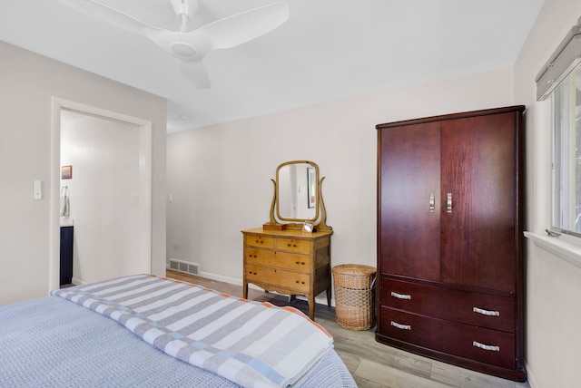 630 Woodworth Ave, Missoula, MT 59801 - bedroom with light wood-type flooring and ceiling fan