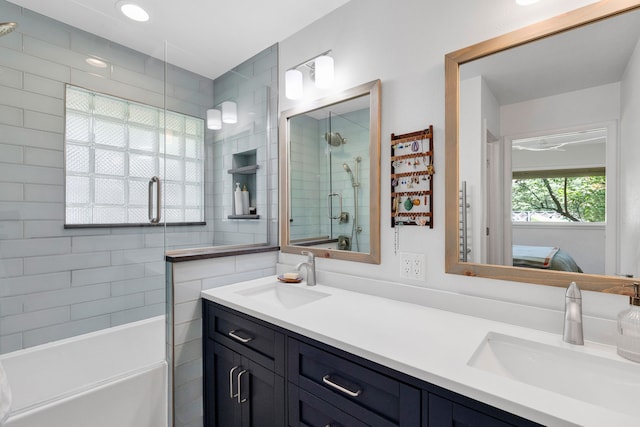 630 Woodworth Ave, Missoula, MT 59801 - ensuite bathroom featuring double vanity and shower / bath combination with glass door