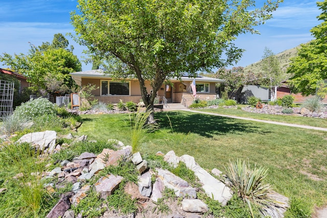 630 Woodworth Ave, Missoula, MT 59801 - ranch-style home with a front yard and stucco siding