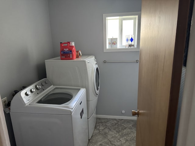 3 Rosebud Ln, Missoula, MT 59801 - laundry room featuring washing machine and clothes dryer and baseboards