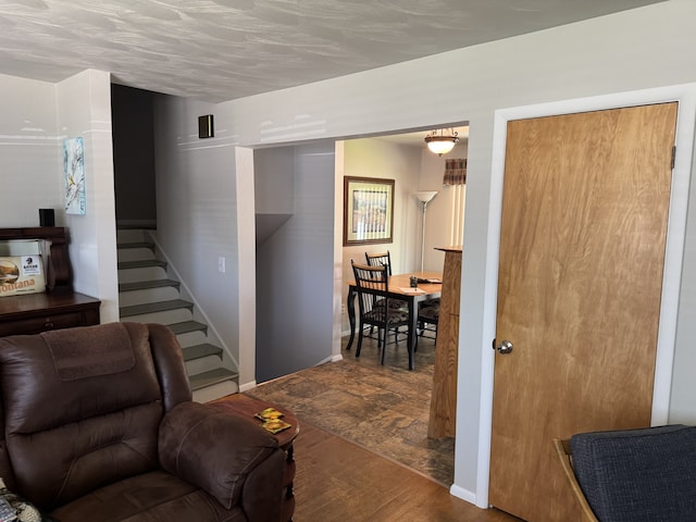 3 Rosebud Ln, Missoula, MT 59801 - living area featuring wood finished floors, stairs, and baseboards