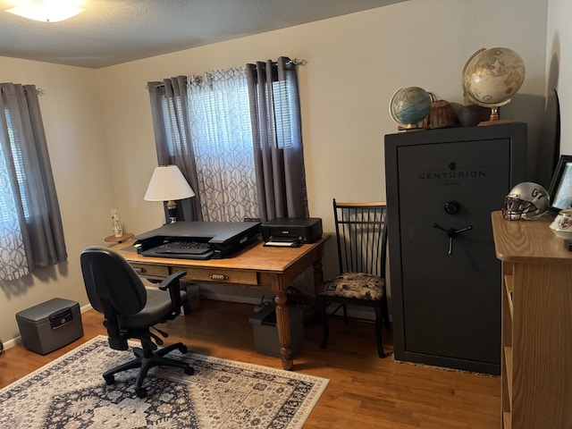3 Rosebud Ln, Missoula, MT 59801 - office area with wood finished floors and baseboards