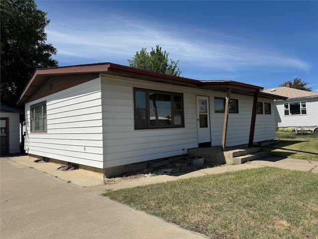 1030 Washington Ave, Havre, MT 59501 - single story home with a front lawn