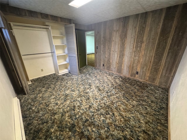 1030 Washington Ave, Havre, MT 59501 - unfurnished bedroom featuring wooden walls