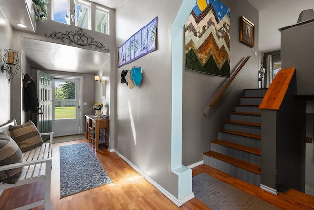 36 Winchester St, Kalispell, MT 59901 - entrance foyer with wood finished floors, stairway, and baseboards