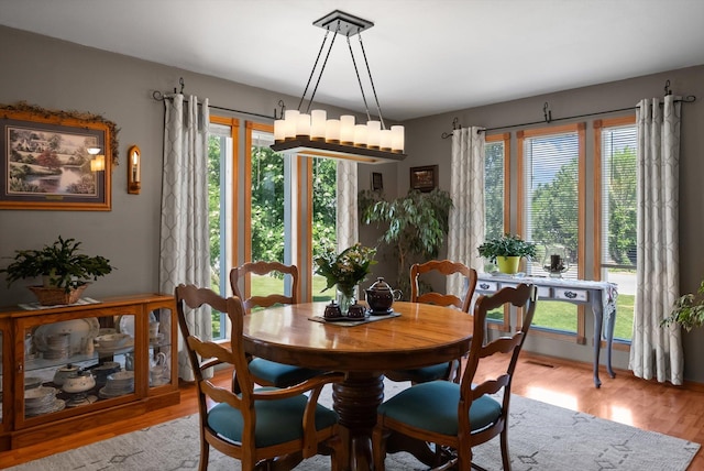 36 Winchester St, Kalispell, MT 59901 - dining room featuring wood finished floors and plenty of natural light