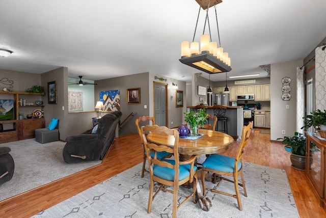 36 Winchester St, Kalispell, MT 59901 - dining room featuring light wood-type flooring and ceiling fan