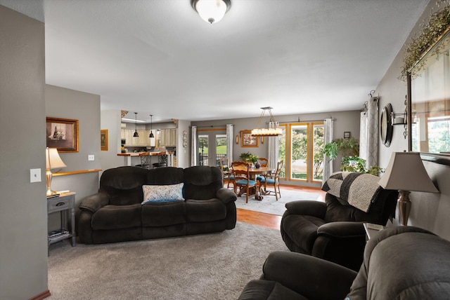 36 Winchester St, Kalispell, MT 59901 - living room featuring plenty of natural light and a chandelier