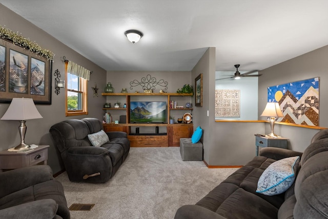 36 Winchester St, Kalispell, MT 59901 - carpeted living area featuring a ceiling fan and baseboards