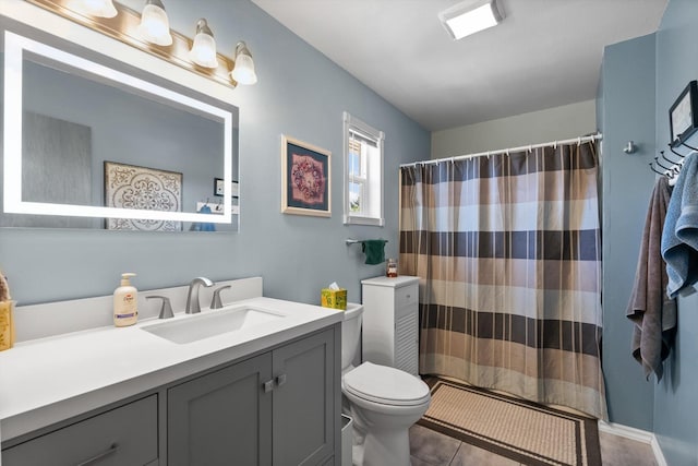 36 Winchester St, Kalispell, MT 59901 - bathroom with toilet, vanity, and a shower with curtain