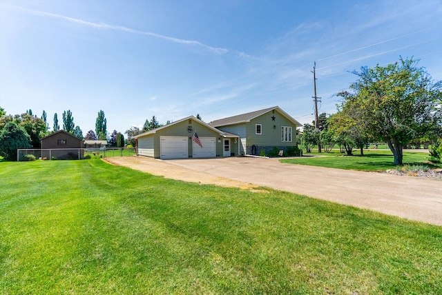 36 Winchester St, Kalispell, MT 59901 - view of front of property featuring driveway and a garage