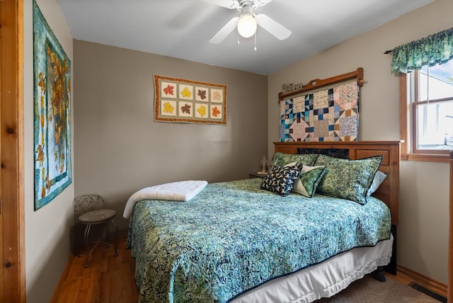 36 Winchester St, Kalispell, MT 59901 - bedroom with wood finished floors, baseboards, and a ceiling fan