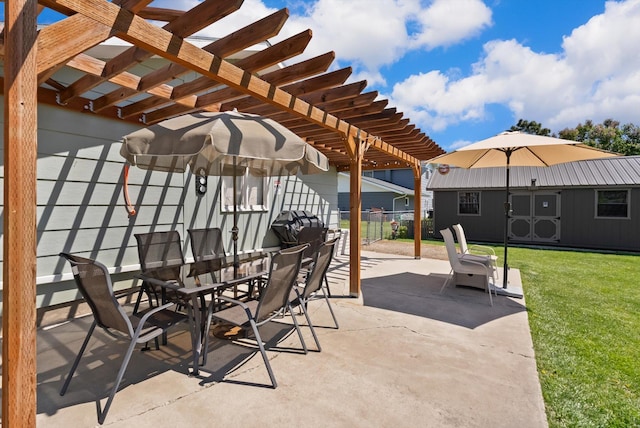 36 Winchester St, Kalispell, MT 59901 - view of patio with a pergola and an outbuilding