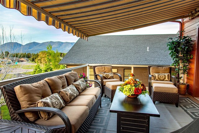 309 Timberwolf Dr, Polson, MT 59860 - view of swimming pool with a mountain view and a hot tub