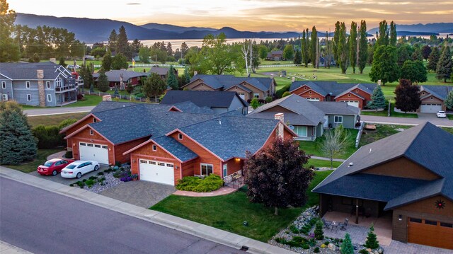 309 Timberwolf Dr, Polson, MT 59860 - rear view of house with a wooden deck and a yard