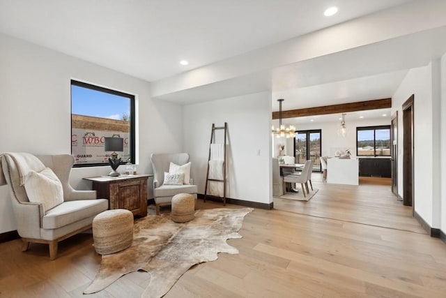1942 Whitefish Ave, Whitefish, MT 59937 - living area with light wood-style floors, a chandelier, and recessed lighting